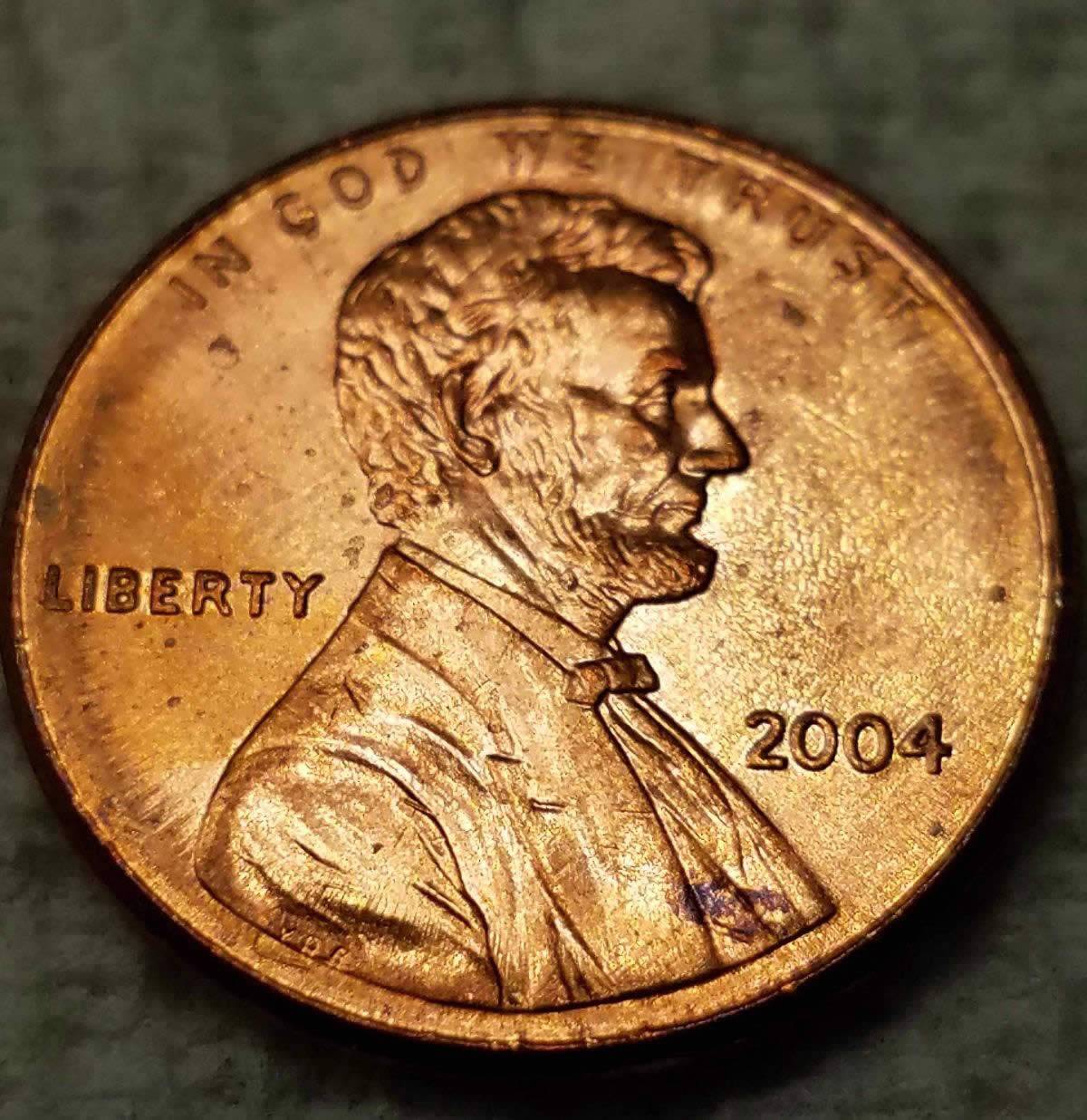 2004-P-Lincoln-Split-Planchet-Top-Of-United-On-The-Reverse?